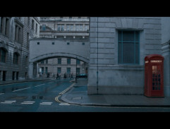 Harry et M. Weasley dans la cabine téléphonique